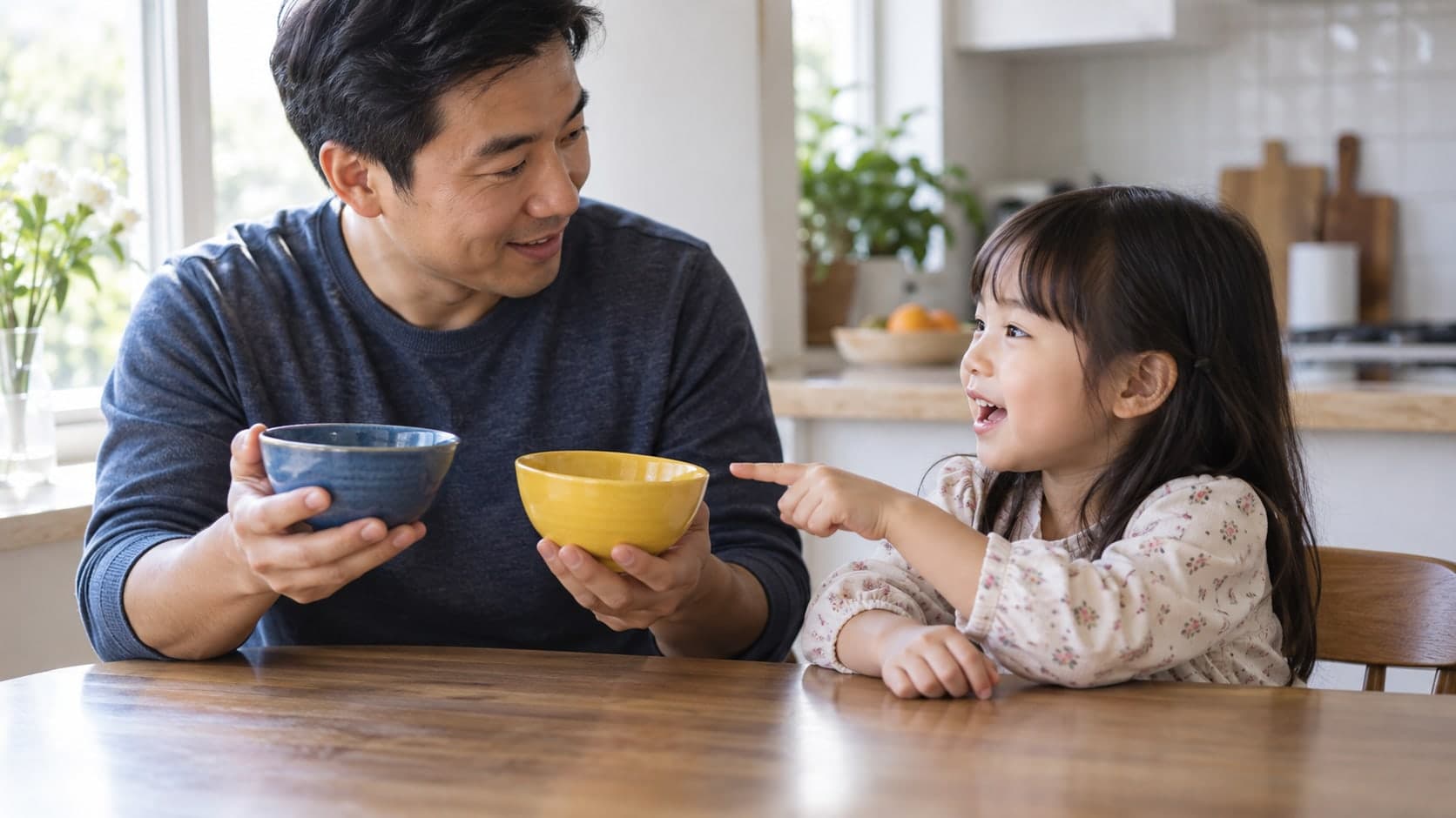 示意圖:家長讓孩子在藍色和黃色的碗之間選擇,留出說話空間